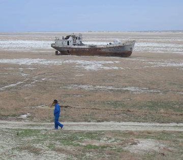 A grounded fishing boat on the floor of the Aral Sea.
